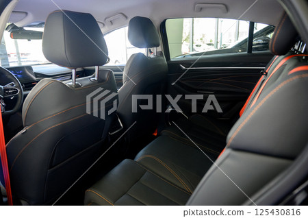 Interior of a modern car with black leather seats Interior of a modern car with black leather seats 125430816