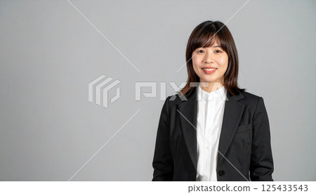 Calm smiling business woman Calm smiling business woman 125433543