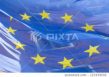 European Union Flag Symbolically Blending with Home Windows 125434030
