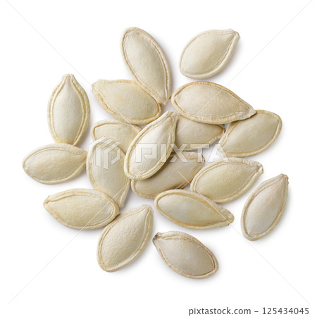 Pumpkin seeds close-up on a white. Top view 125434045