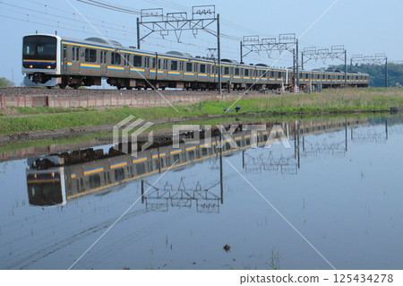209 series reflected in the water 125434278