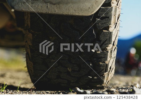 All terrain tyre on off-road vehicle 125438428
