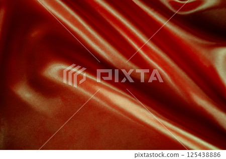 Top view of dark red silky sheen suitable for design and wallpaper decoration 125438886