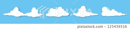 A set of icons of white fluffy clouds with a shadow on a blue background. 125439316