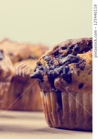 Chocolate muffin closeup Chocolate muffin closeup 125440119