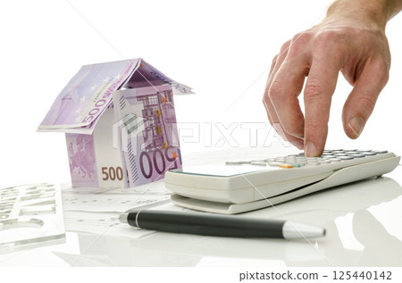 Contractor calculating costs of a house 125440142