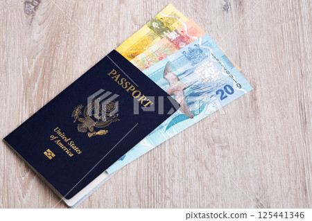 American passport with Fijian dollar American passport with Fijian dollar 125441346