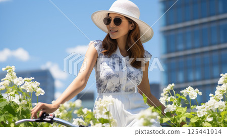 Japanese women riding bicycles Japanese women riding bicycles 125441914