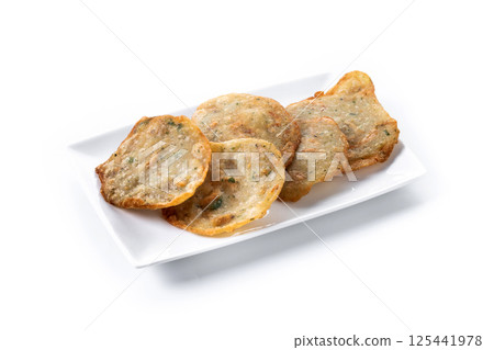 Tortillitas de camarones isolated on white background 125441978