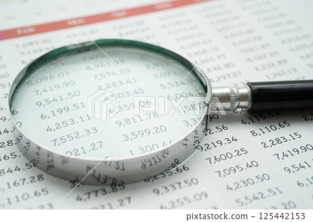 Magnifying glass on charts graphs paper. Financial development, Banking Account, Statistics, Investment Analytic research data economy. Magnifying glass on charts graphs paper. Financial development, Banking Account, Statistics, Investment Analytic research data economy. 125442153