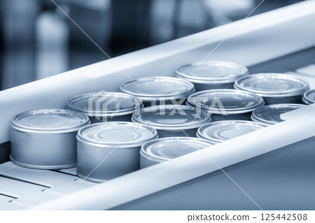 The tinned can food production line in the light blue scene. 125442508