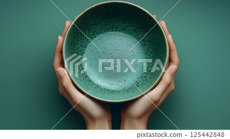 salad bowl hands top view minimalist 125442848