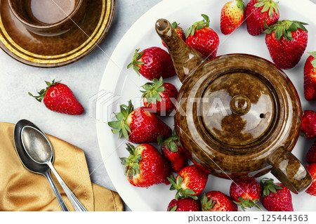 Fresh summer tea with strawberries. 125444363
