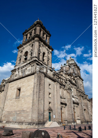 Facade of the historical Metropolitan Cathedral of Mexico City built between 1573 and 1813. Metropolitan Cathedral of the Assumption of the Most Blessed Virgin Mary into Heaven. 125445827