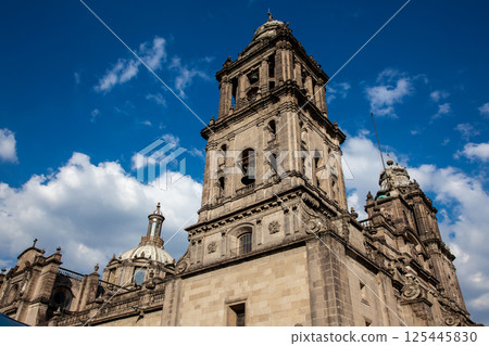 Facade of the historical Metropolitan Cathedral of Mexico City built between 1573 and 1813. Metropolitan Cathedral of the Assumption of the Most Blessed Virgin Mary into Heaven. 125445830