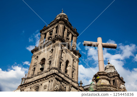 Facade of the historical Metropolitan Cathedral of Mexico City built between 1573 and 1813. Metropolitan Cathedral of the Assumption of the Most Blessed Virgin Mary into Heaven. 125445836