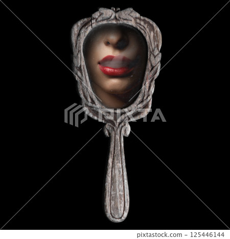 Retro vintage hand mirror and woman face with smoke 125446144