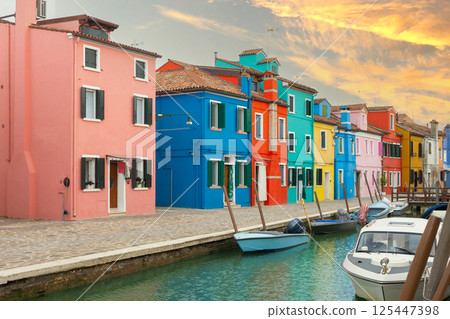 Colorful houses and canal at sunset in Burano 125447398
