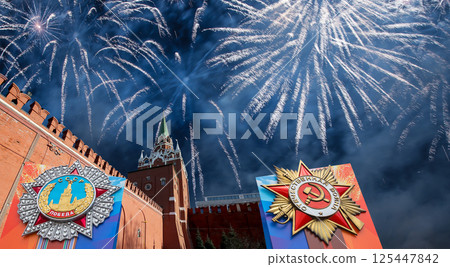 Moscow Kremlin (with orders of victory) and fireworks in honor of Victory Day celebration (WWII), Russia-- the most popular view. English translation from Russian: USSR, Victory, Patriotic war Moscow Kremlin (with orders of victory) and fireworks in honor of Victory Day celebration (WWII), Russia-- the most popular view. English translation from Russian: USSR, Victory, Patriotic war 125447842