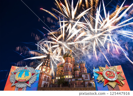 Cathedral of Intercession of Most Holy Theotokos on the Moat (Temple of Basil the Blessed) with orders of victory, and fireworks in honor of Victory Day celebration (WWII), Red Square, Moscow, Russia 125447916