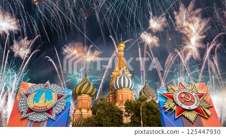 Cathedral of Intercession of Most Holy Theotokos on the Moat (Temple of Basil the Blessed) with orders of victory, and fireworks in honor of Victory Day celebration (WWII), Red Square, Moscow, Russia 125447930