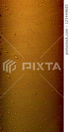 Pattern of variety size drops on golden glossy surface. Stock Photo For Abstract Golden Vertical Backgrounds Pattern of variety size drops on golden glossy surface. Stock Photo For Abstract Golden Vertical Backgrounds 125449685