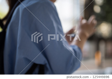 Woman going out Woman going out 125449896