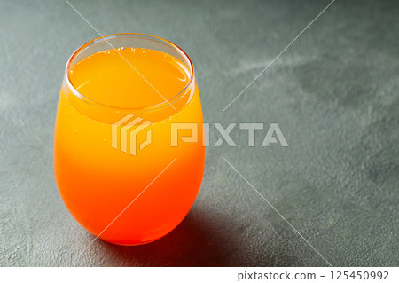 Dirty Soda in Transparent Glass on Green Background, Trendy Carbonated Drink Concept, Copy Space 125450992