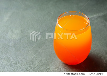 Dirty Soda in Transparent Glass on Green Background, Trendy Carbonated Drink Concept, Copy Space Dirty Soda in Transparent Glass on Green Background, Trendy Carbonated Drink Concept, Copy Space 125450993