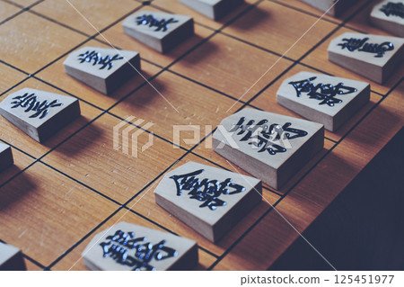Shogi board and pieces close-up 125451977