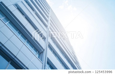 Modern urban architecture with soft sunlight and sky gradient 125453996