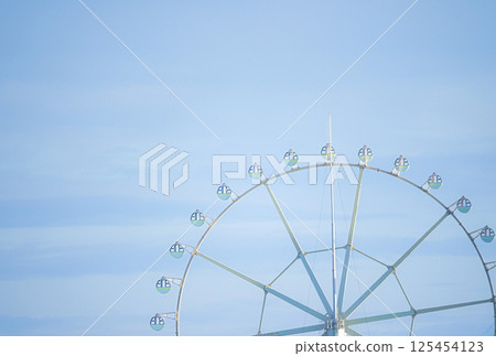 Simple landscape with a ferris wheel on a white background 125454123