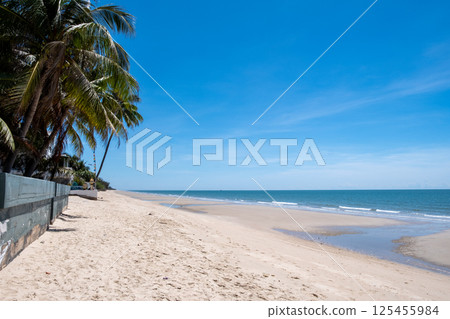 Cha-am Beach with Blue Sky and Calm Sea 125455984