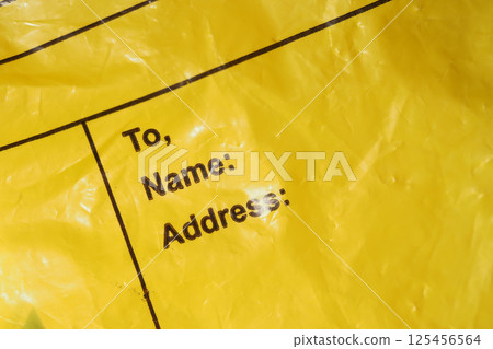 Yellow envelope with address fields ready for delivery Yellow envelope with address fields ready for delivery 125456564
