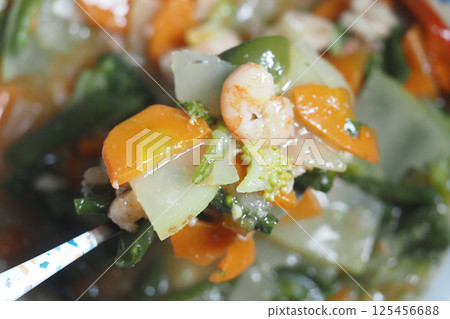 Mixed vegetable and shrimp stir-fry with vibrant colors and textures 125456688