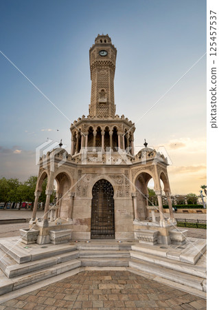 Izmir Clock Tower stands tall in Konak Square during the evening light in Izmir, Turkey Izmir Clock Tower stands tall in Konak Square during the evening light in Izmir, Turkey 125457537