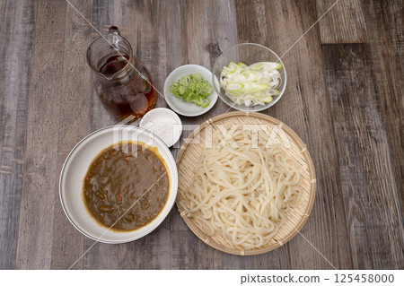 Curry udon made from leftover curry served in a bowl Curry udon made from leftover curry served in a bowl 125458000