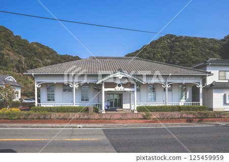 March 23 2025 Traditional Japanese Building Surrounded by Green Hills , Japan 125459959