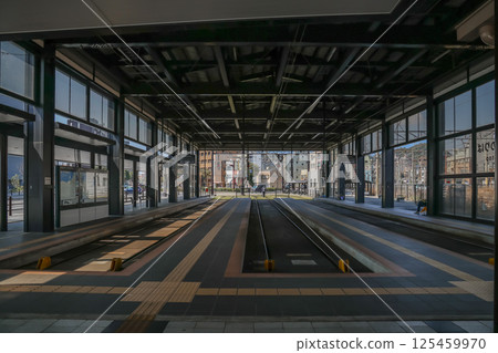 March 23 2025 Empty Modern Tram Station Interior with Rail Tracks, Japan 125459970