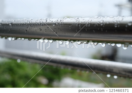 Clothesline on rainy day 125460371