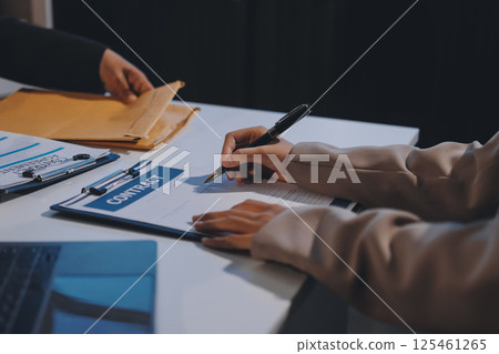 Concept of legal counseling. The lawyer or legal counsel is listening and providing advice to business people. 125461265