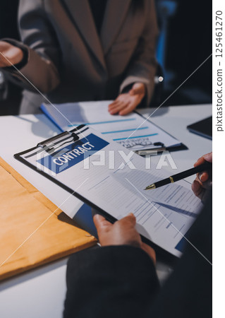 Concept of legal counseling. The lawyer or legal counsel is listening and providing advice to business people. 125461270