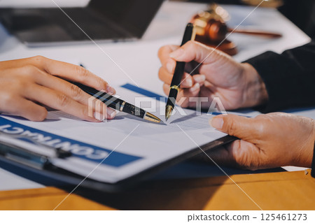 Concept of legal counseling. The lawyer or legal counsel is listening and providing advice to business people. 125461273