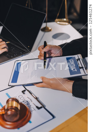 Concept of legal counseling. The lawyer or legal counsel is listening and providing advice to business people. 125461274