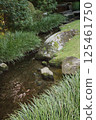 Water flow in the Japanese garden 125461750