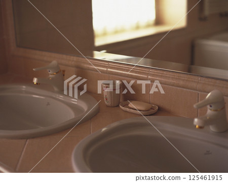 Bathroom sink in a stylish villa on the outskirts of Rome 125461915