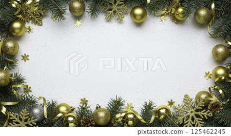 Festive Christmas arrangement against a snowy white background. Sprigs of evergreen branches are adorned with gold ornaments and snowflakes, creating a wintery scene. 125462245