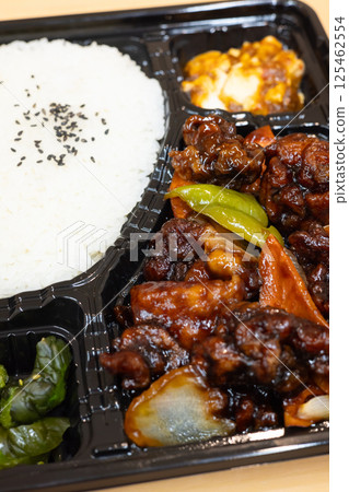 Delicious Chinese bento with black vinegar chicken Delicious Chinese bento with black vinegar chicken 125462554
