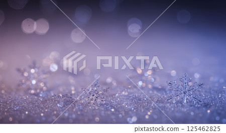 Macro shot captures clear, iridescent snowflakes on a snow covered surface, reflecting various colors. Winter holiday background with a festive, cool toned aesthetic. 125462825