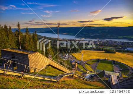 Summer Sunset over Lillehammer and Ski Jumping Arena, Norway Summer Sunset over Lillehammer and Ski Jumping Arena, Norway 125464768